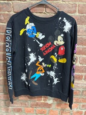Disney Mickey & Friends Graphic Sweatshirt with Colorful Prints and white splat
